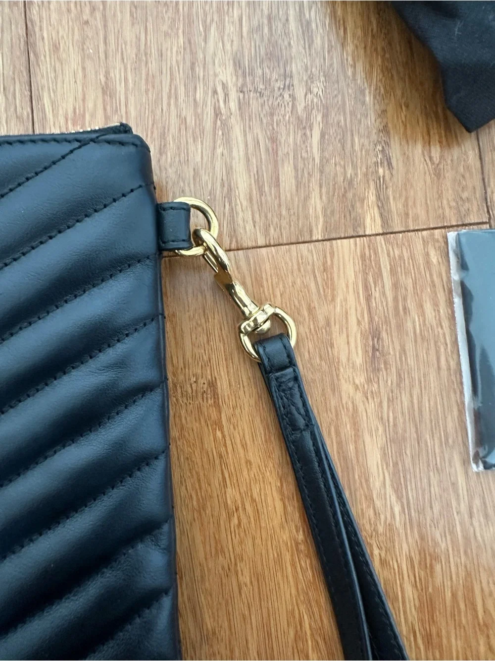 Saint Laurent Black Quilted Leather Wristlet with Gold YSL Emblem
